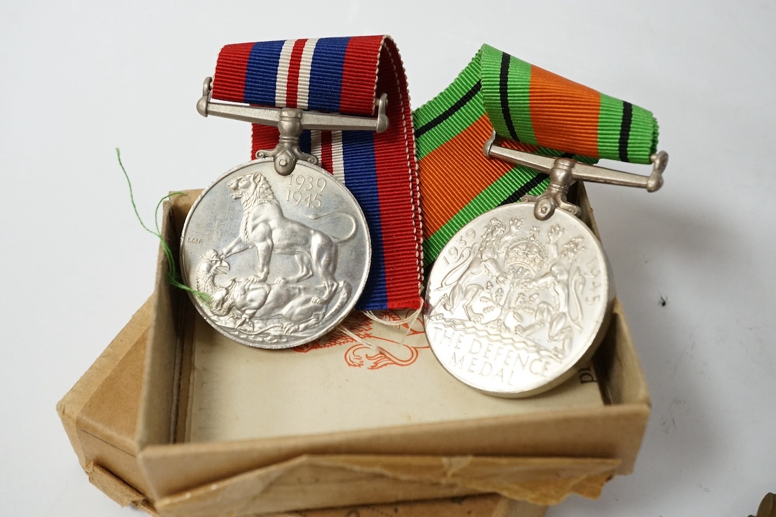 Nine military medals including; a First World War medal pair to T3-026887 DVR. C. Oldfield. A.S.C., a WWII group comprising; The Atlantic Star, The 1939-1945 Star, The Italy Star and The 1939-1945 Medal with a clasp for